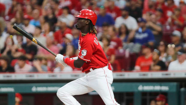 Cincinnati Reds third baseman Elly De La Cruz reacts after hitting his first career hit.